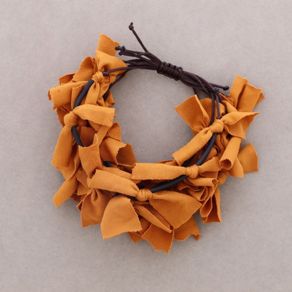 MACRAMÉ MULTI-STRAP FRINGE FABRIC BRACELET
