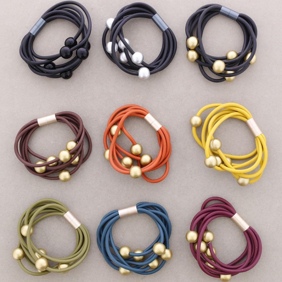 PULSERA 6 TIRAS CAUCHO BOLAS
