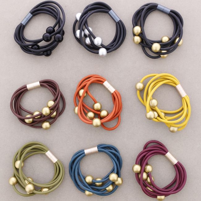PULSERA 6 TIRAS CAUCHO BOLAS
