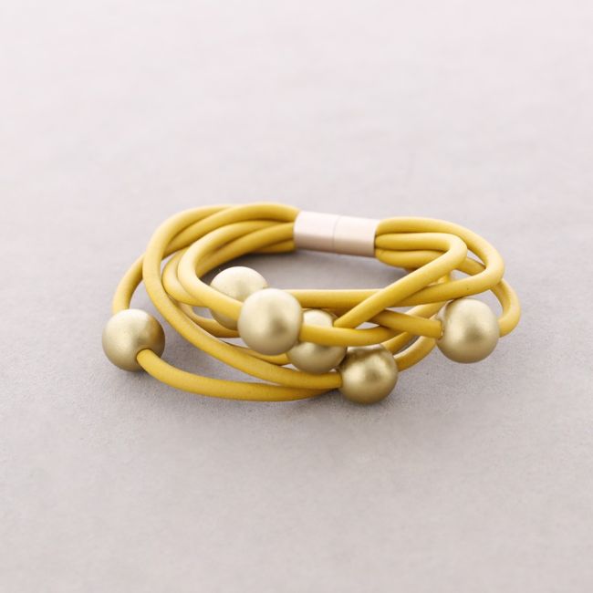 PULSERA 6 TIRAS CAUCHO BOLAS