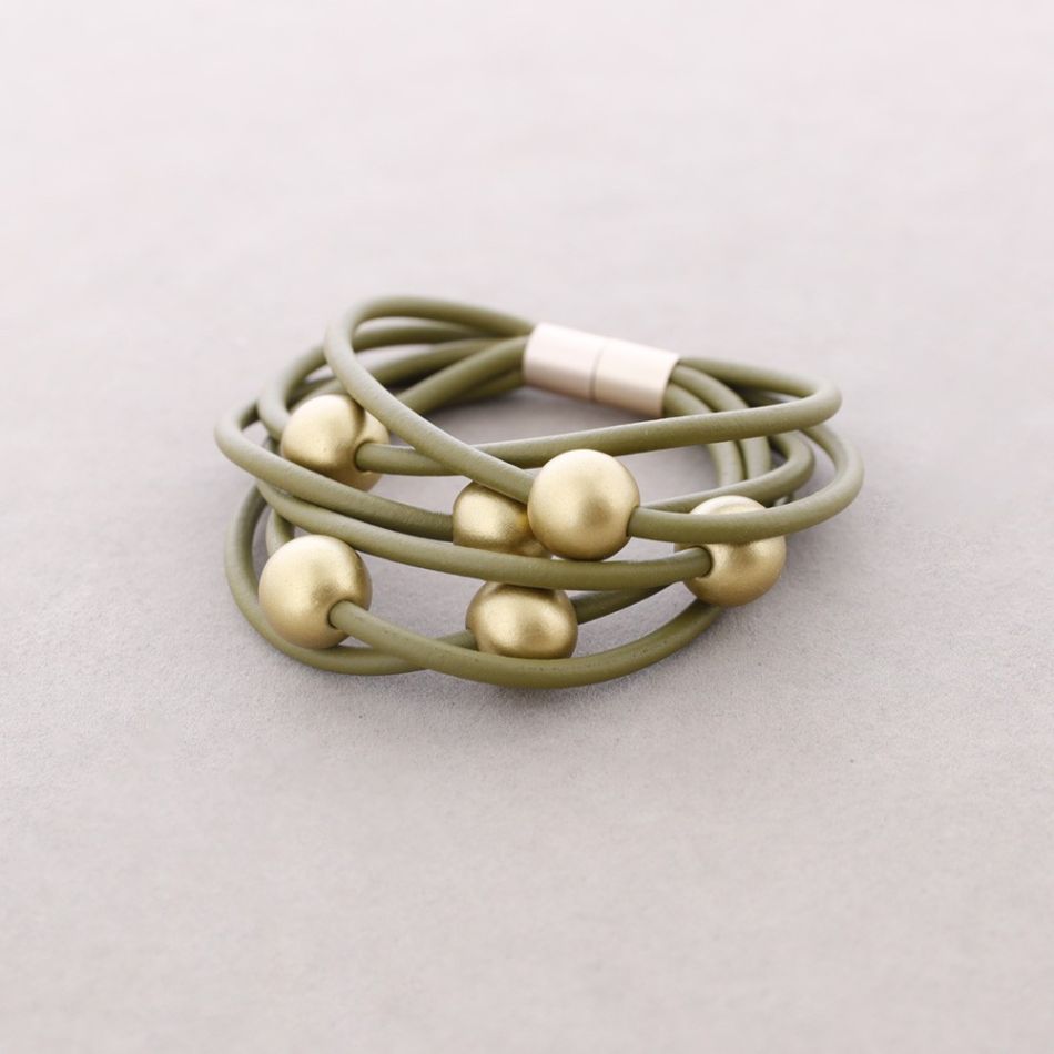 PULSERA 6 TIRAS CAUCHO BOLAS