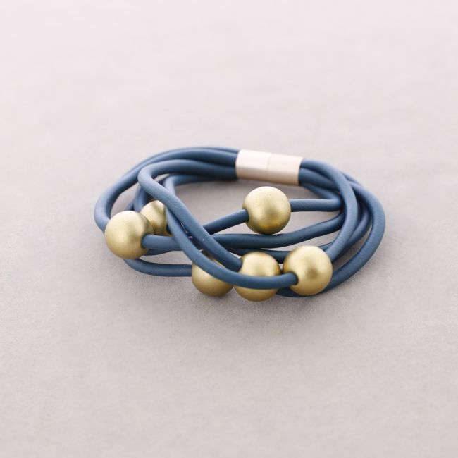 PULSERA 6 TIRAS CAUCHO BOLAS