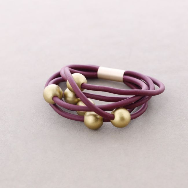 PULSERA 6 TIRAS CAUCHO BOLAS