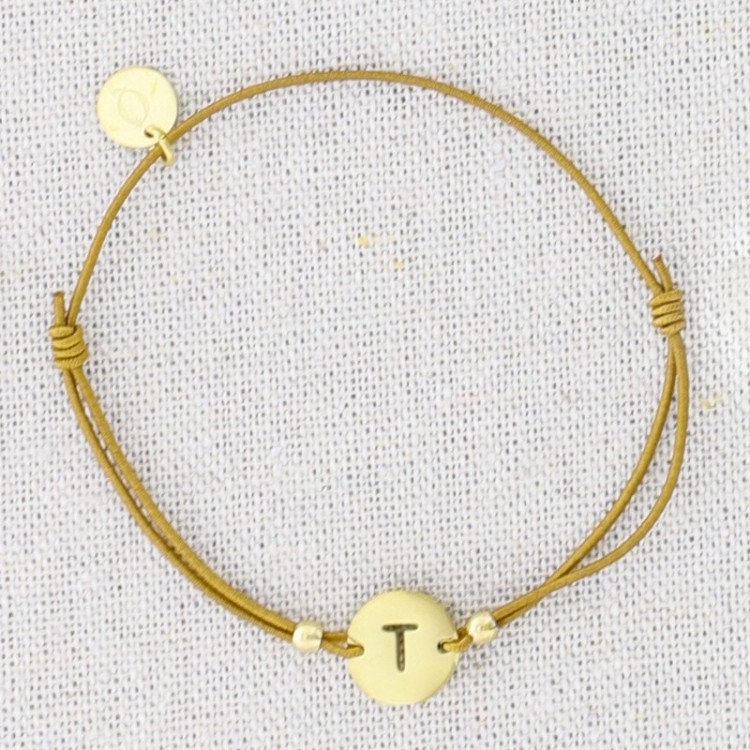 PULSERA ELÁSTICA ACERO LETRA T