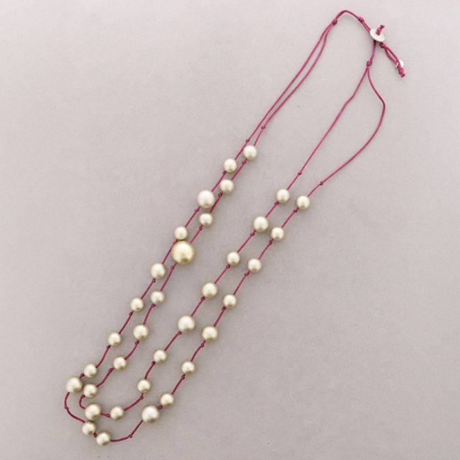 LONG DOUBLE BALL NECKLACE WITH METAL FINISH