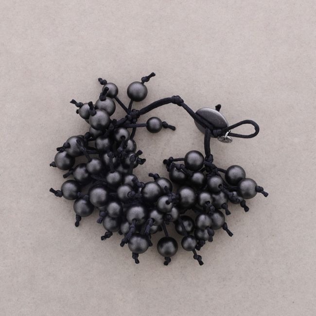 FRINGE BRACELET WITH METAL FINISH BALLS
