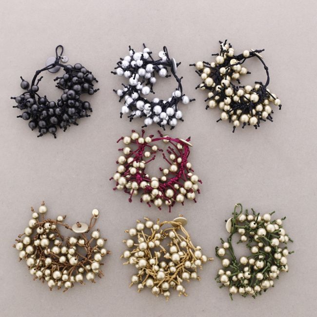 FRINGE BRACELET WITH METAL FINISH BALLS