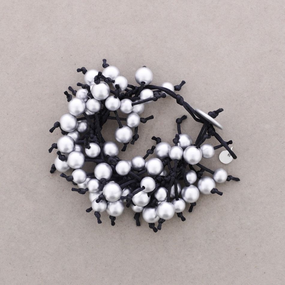 FRINGE BRACELET WITH METAL FINISH BALLS