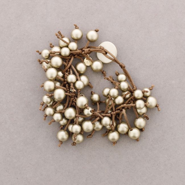 FRINGE BRACELET WITH METAL FINISH BALLS