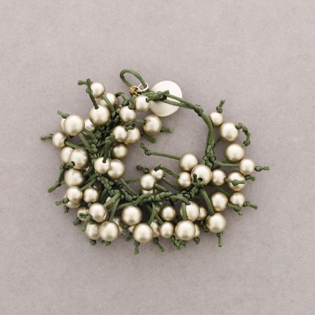 FRINGE BRACELET WITH METAL FINISH BALLS