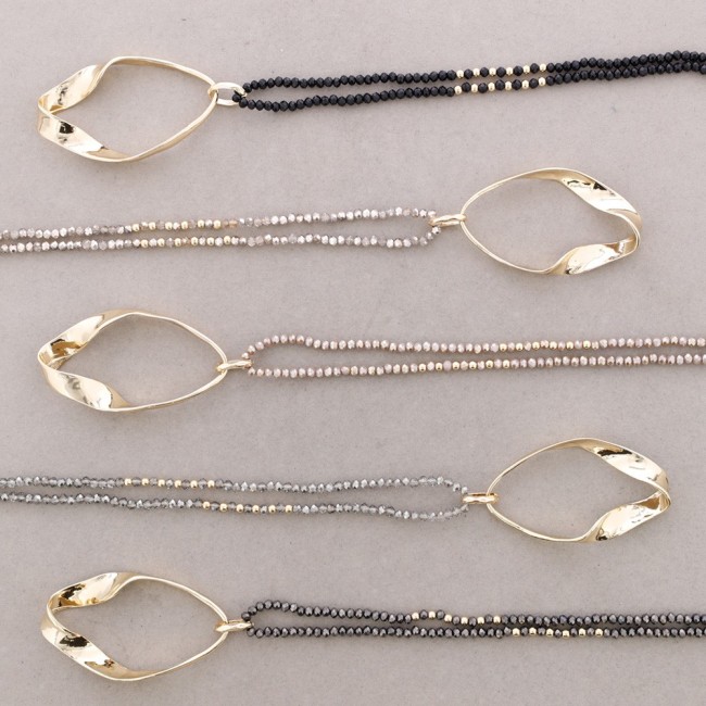 LONG NECKLACE WITH FACETED CRYSTALS AND IRREGULAR RING PENDANT