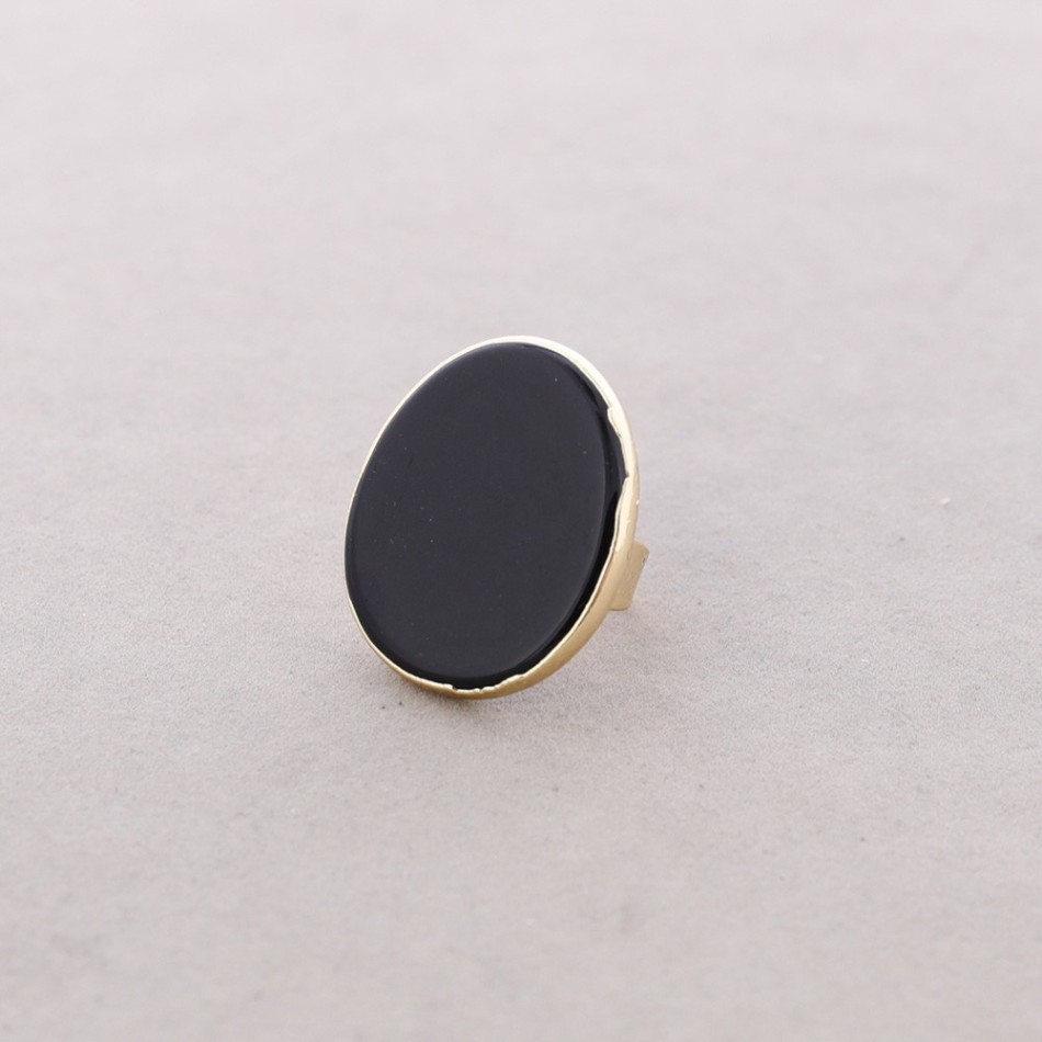 BRONZE RING WITH IRREGULAR STONE