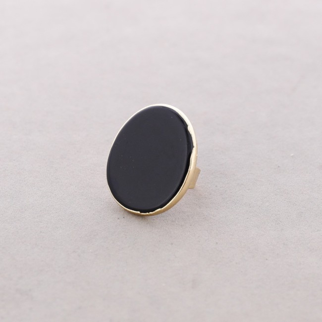BRONZE RING WITH IRREGULAR STONE