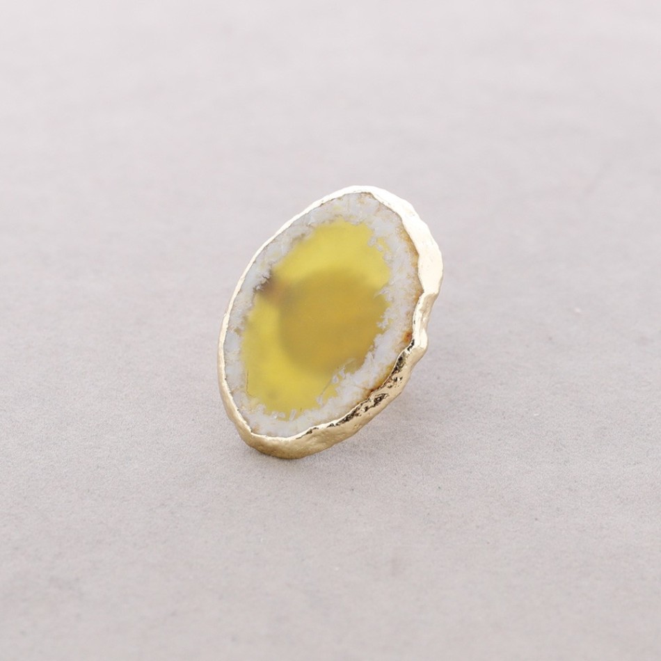 BRONZE RING WITH IRREGULAR STONE