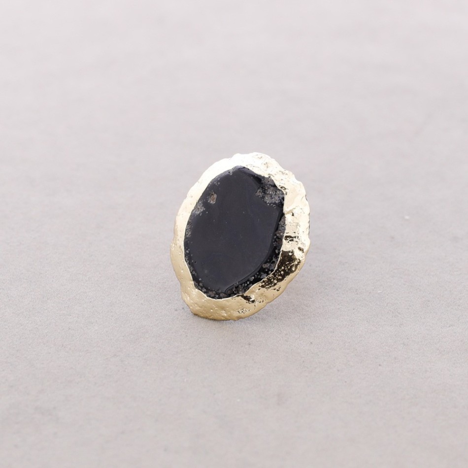 BRONZE RING WITH IRREGULAR STONE