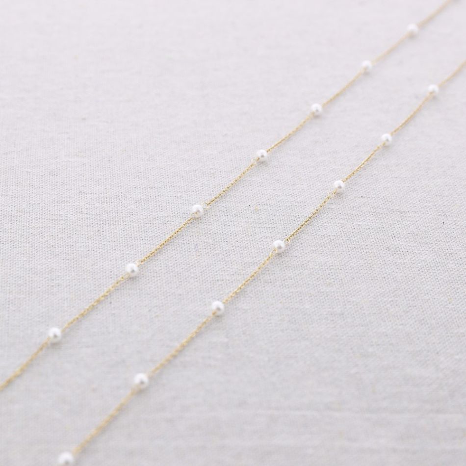 LONG STEEL NECKLACE WITH IMITATION PEARL BEADS