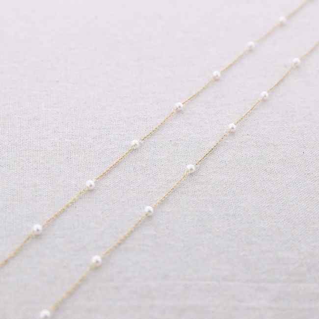 LONG STEEL NECKLACE WITH IMITATION PEARL BEADS
