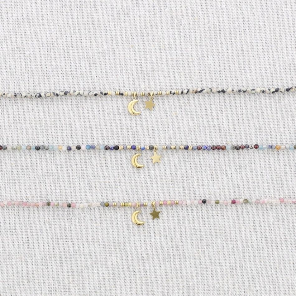 STEEL NECKLACE WITH STONES AND STAR AND MOON PENDANT