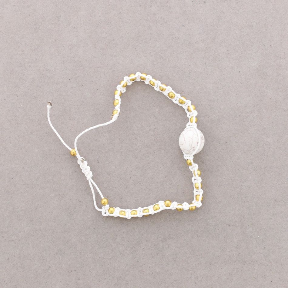 KNOTTED BRACELET WITH METAL BEADS AND STONES