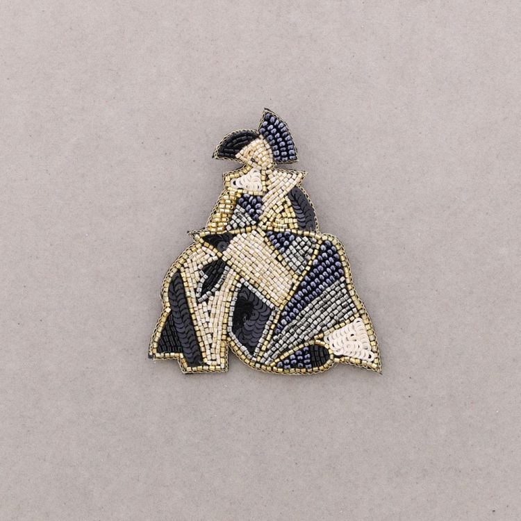 BROCHE MENINA LENTEJUELAS