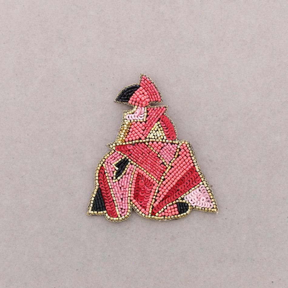 BROCHE MENINA LENTEJUELAS