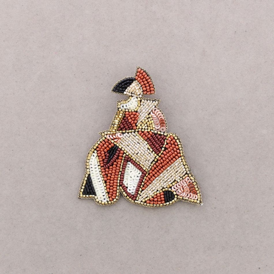 BROCHE MENINA LENTEJUELAS