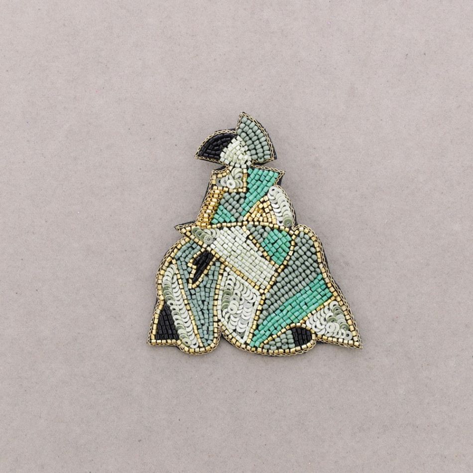 BROCHE MENINA LENTEJUELAS