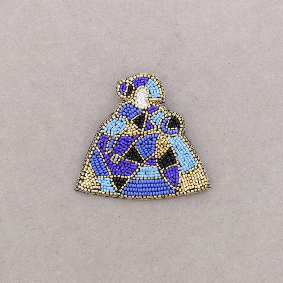 BROCHE MENINA LENTEJUELAS