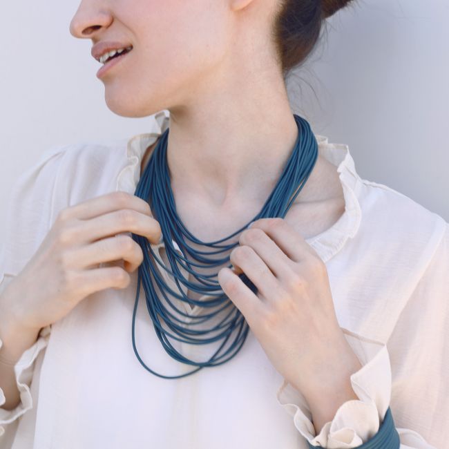 MULTI-ROW RUBBER CHOKER