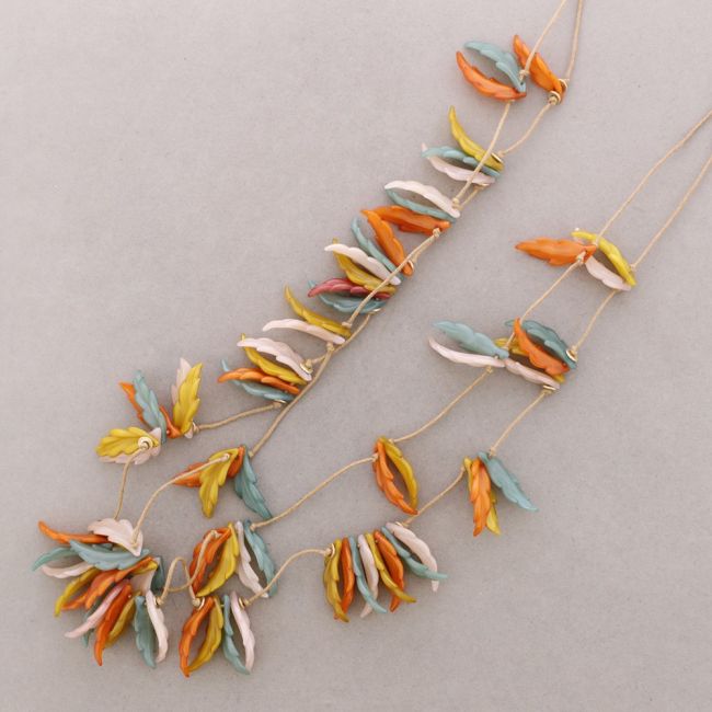 LONG DOUBLE NECKLACE WITH RESIN LEAF PENDANTS