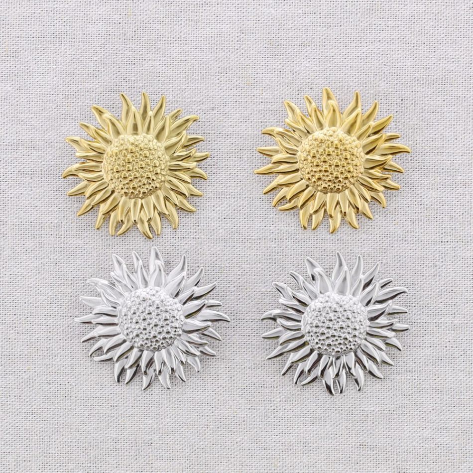 PENDIENTES PRESIÓN ACERO FLOR DE GIRASOL