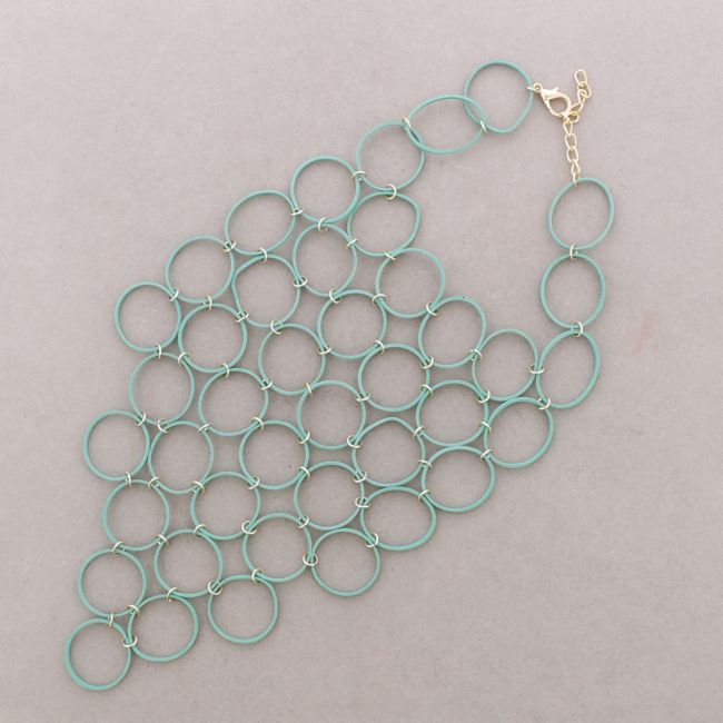 COLLAR BABERO ANILLA METAL GOMA