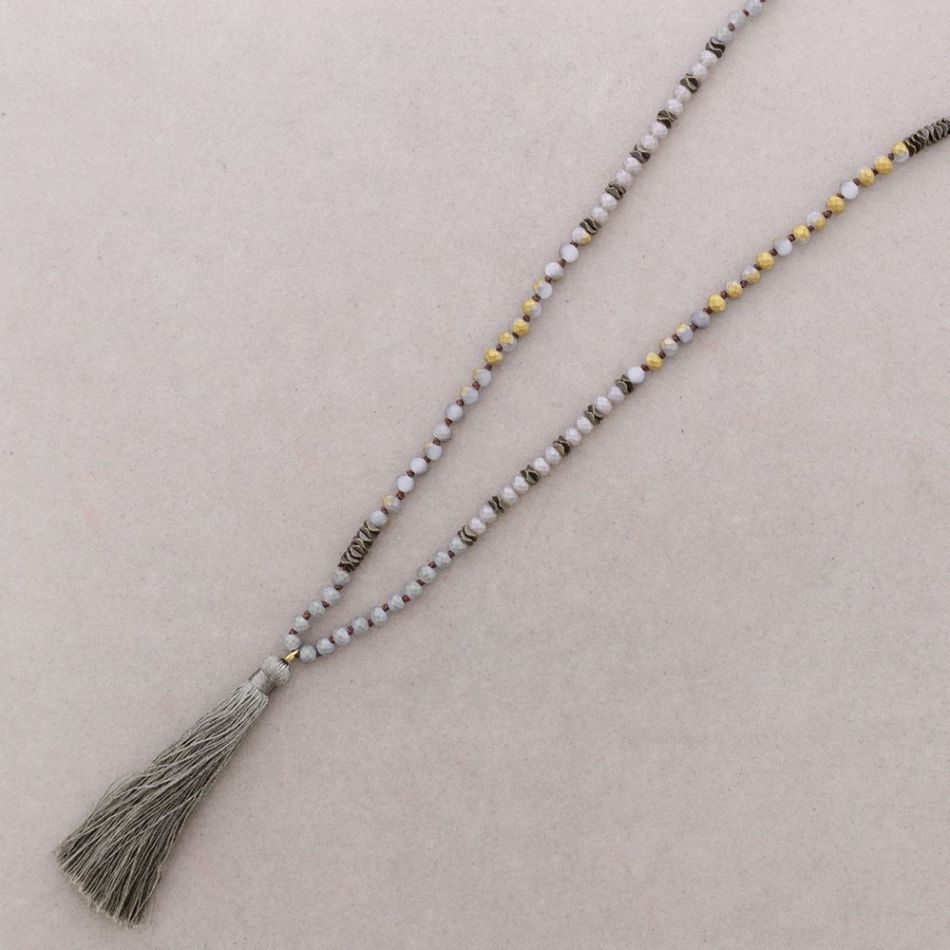 LONG NECKLACE WITH FACETED BEADS AND FRINGE PENDANT