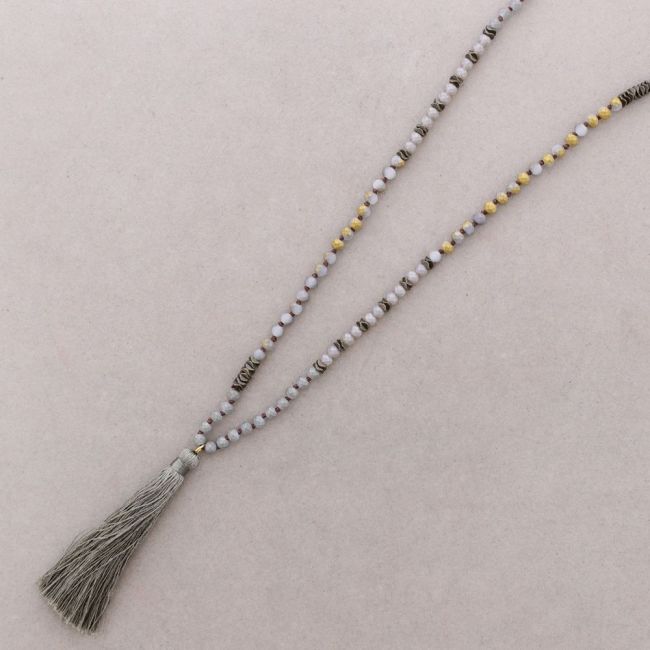 LONG NECKLACE WITH FACETED BEADS AND FRINGE PENDANT