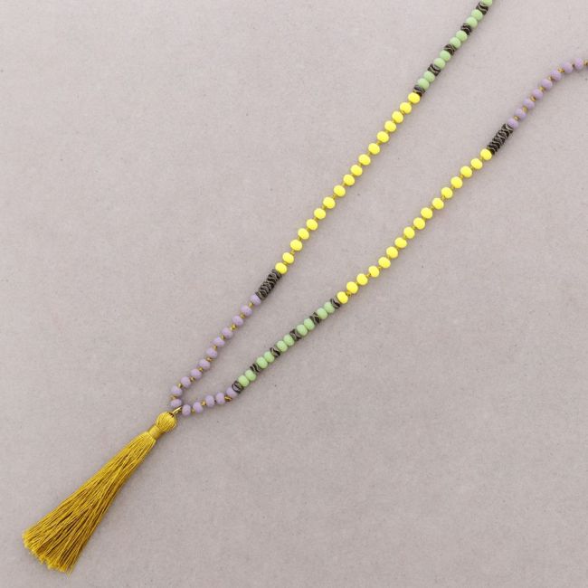 LONG NECKLACE WITH FACETED BEADS AND FRINGE PENDANT