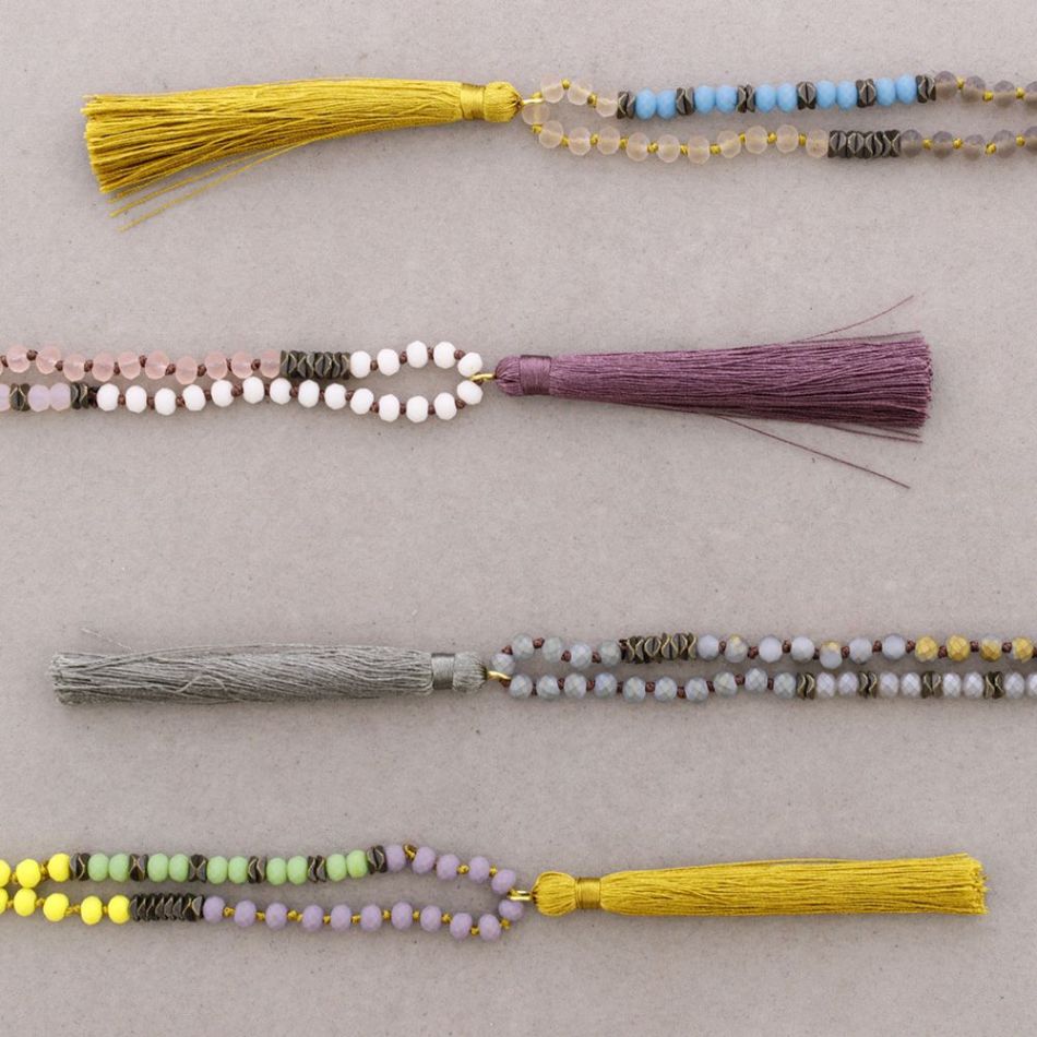 LONG NECKLACE WITH FACETED BEADS AND FRINGE PENDANT