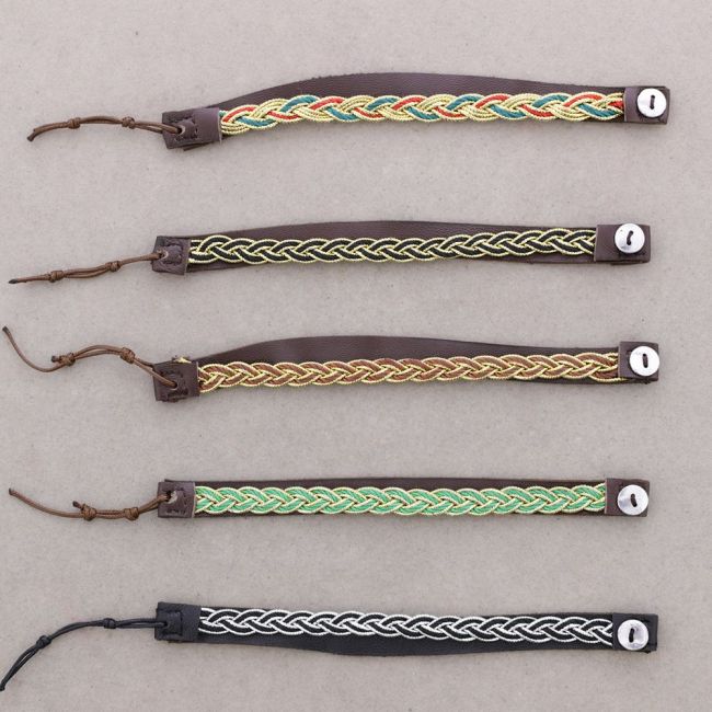 PULSERA TRENZADA CIERRE CUERO