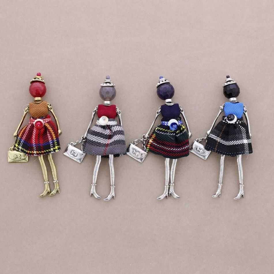 BROCHE COLGANTE MUÑECA