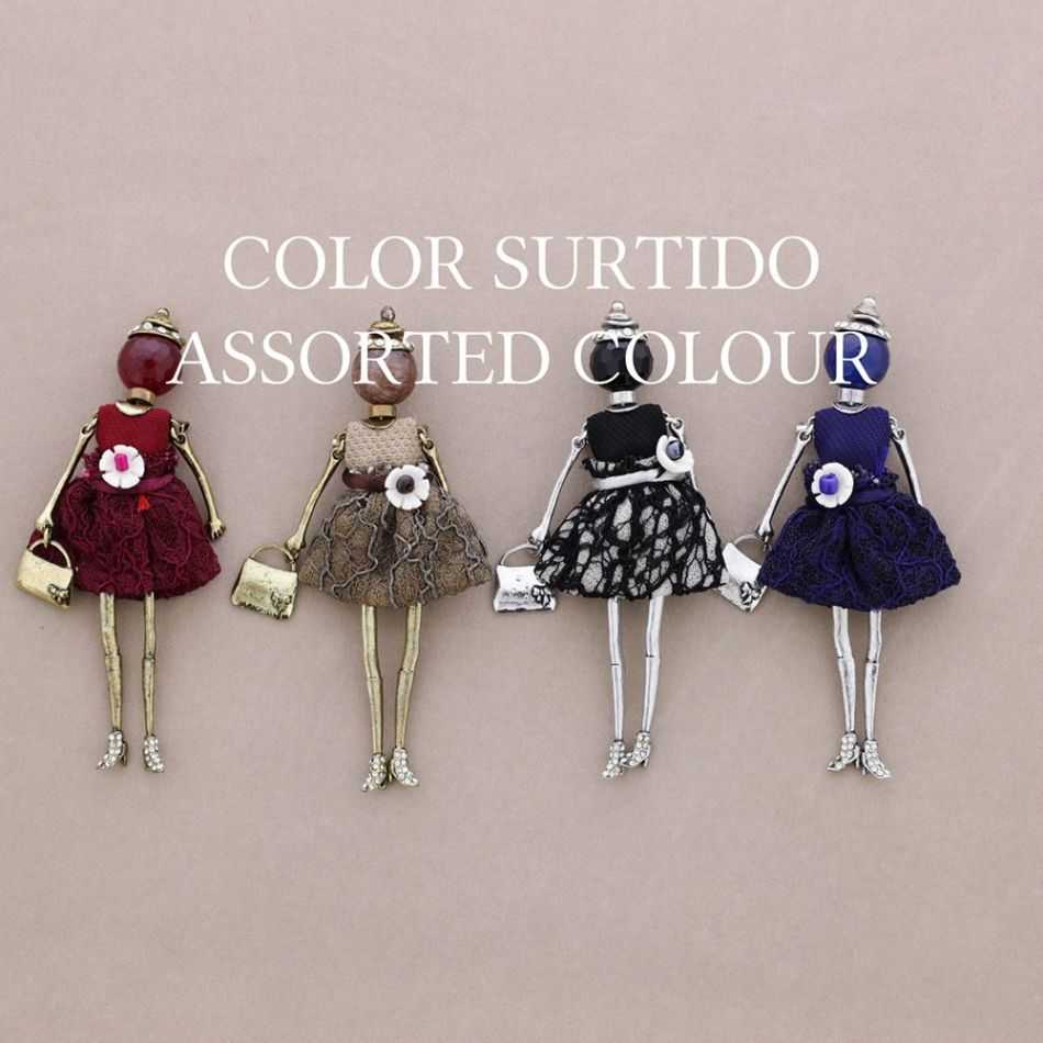 BROCHE METAL MUÑECA