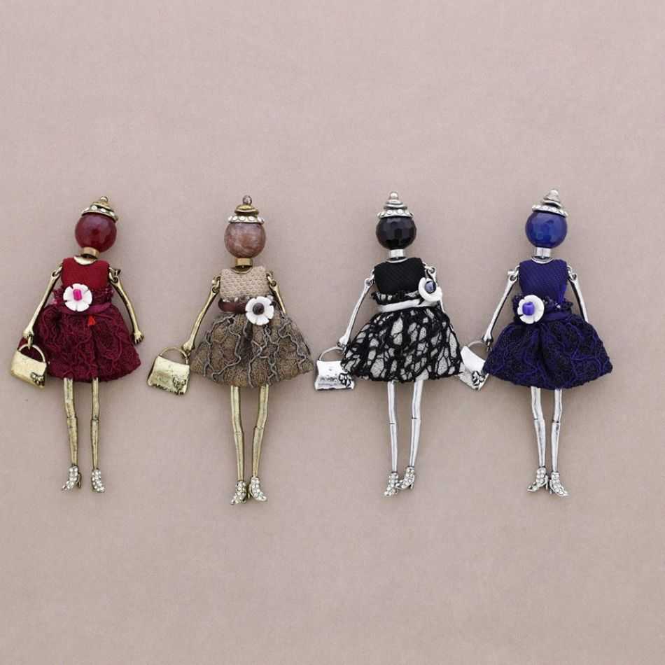 BROCHE METAL MUÑECA