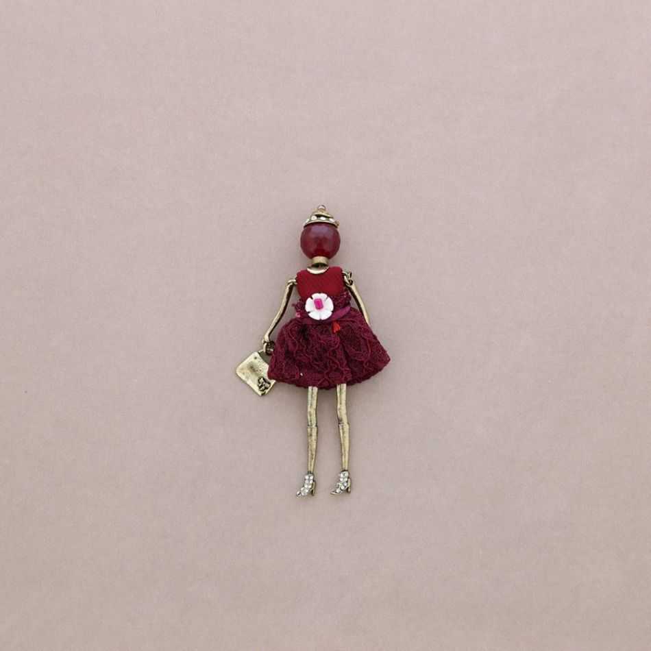 BROCHE METAL MUÑECA