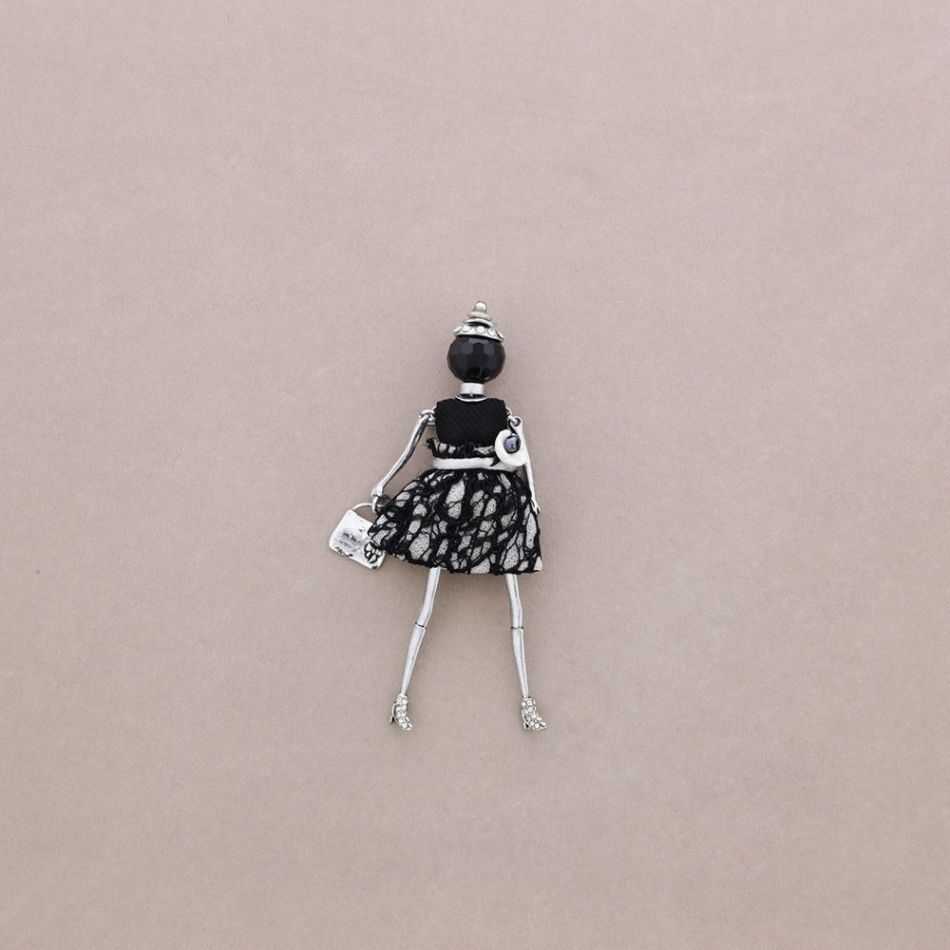 BROCHE METAL MUÑECA
