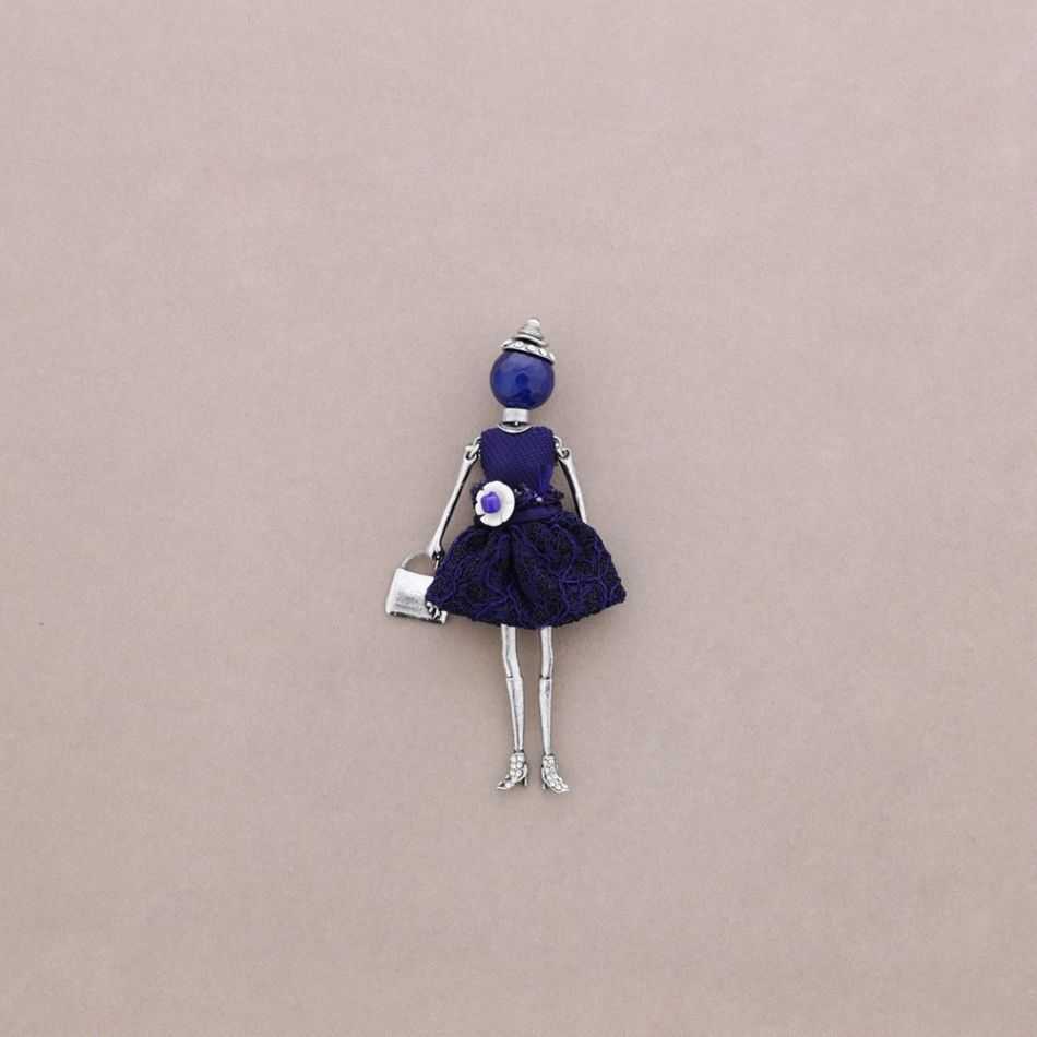 BROCHE METAL MUÑECA