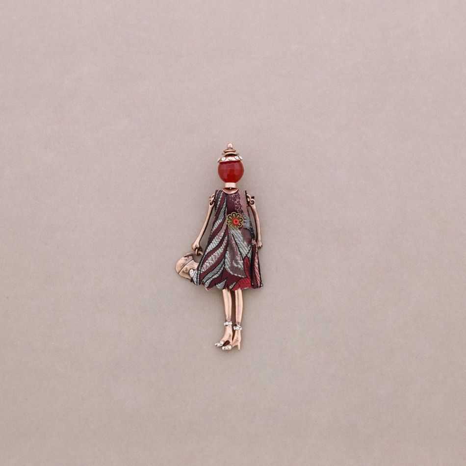BROCHE METAL MUÑECA