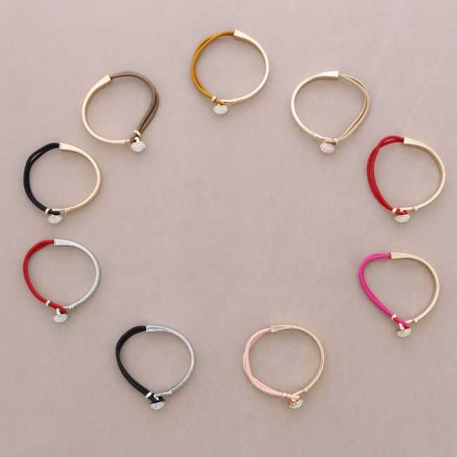 LEATHER, METAL, AND CRYSTALS BRACELET