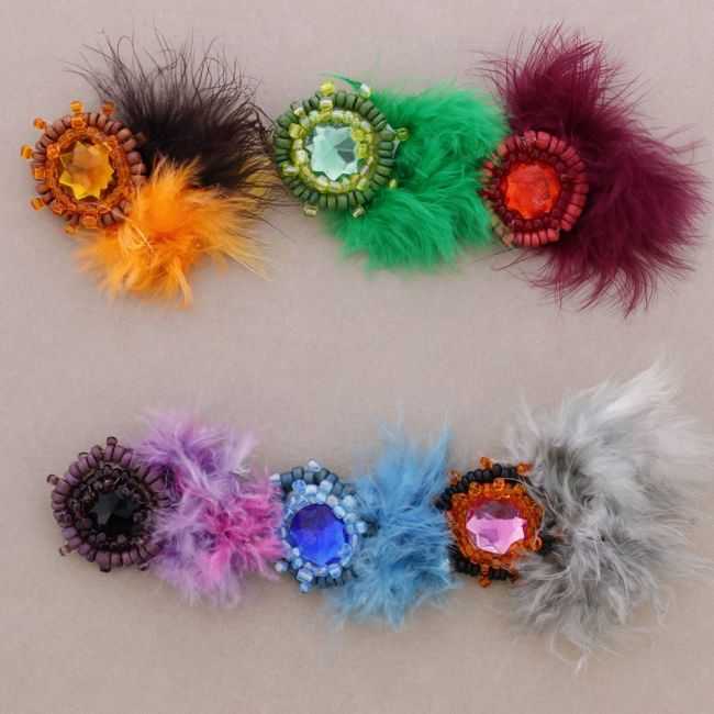 BROCHE PLUMA CRISTAL AC. CUENTAS