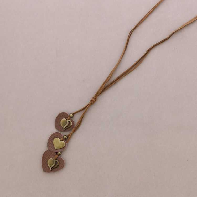 COLLAR LARGO COLG.METAL CUERO 2