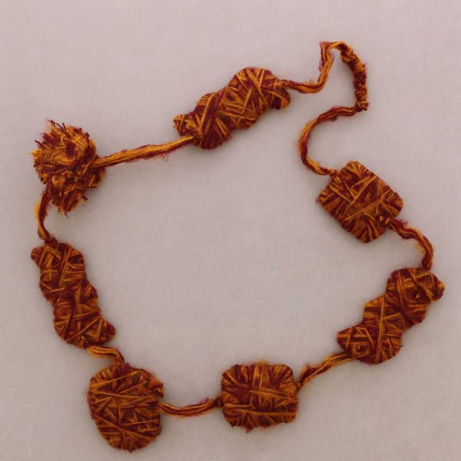 LONG BEADED NECKLACE