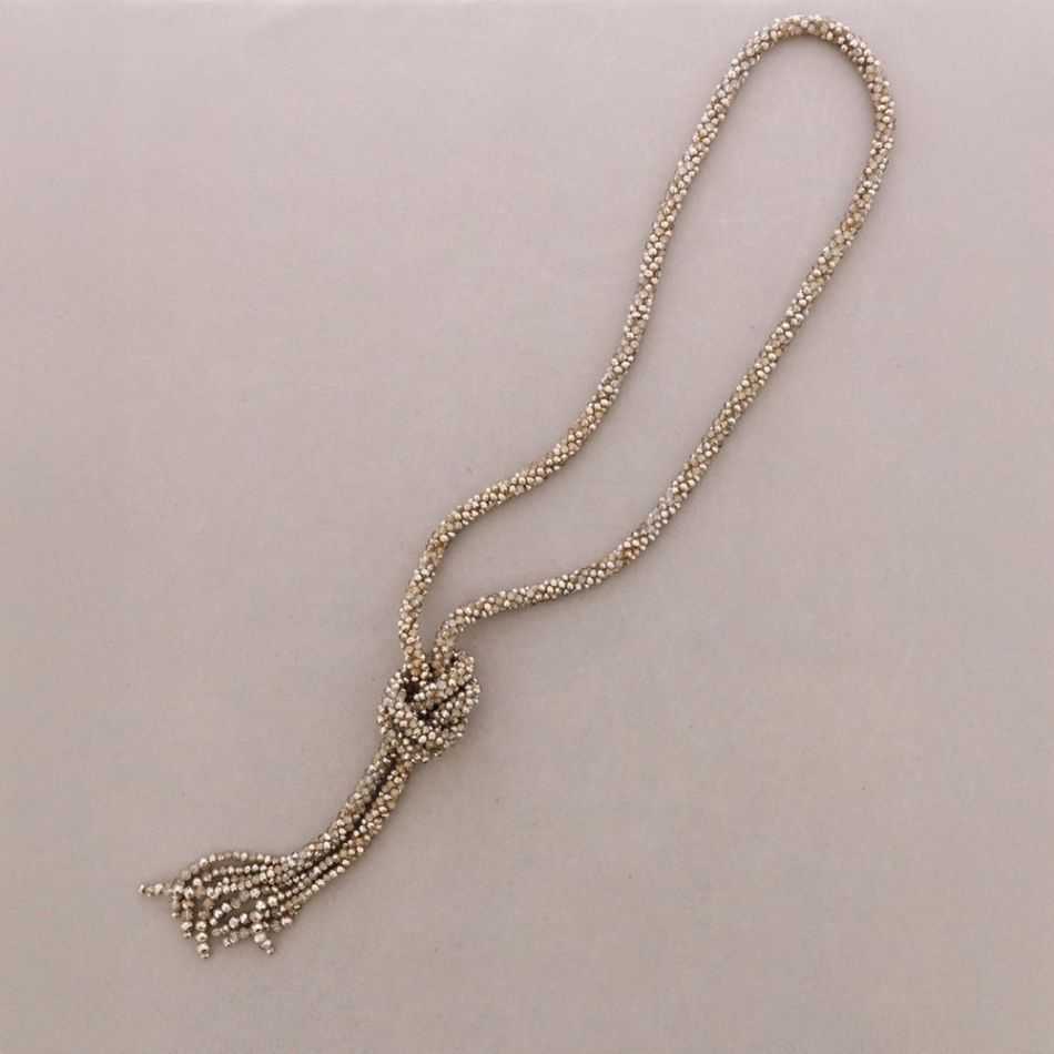 COLLAR LARGO NUDO BOLITAS CRISTALES