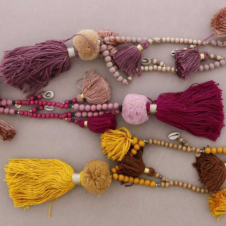 LONG NECKLACE WITH WOODEN BEADS AND POMPOM FRINGES 2